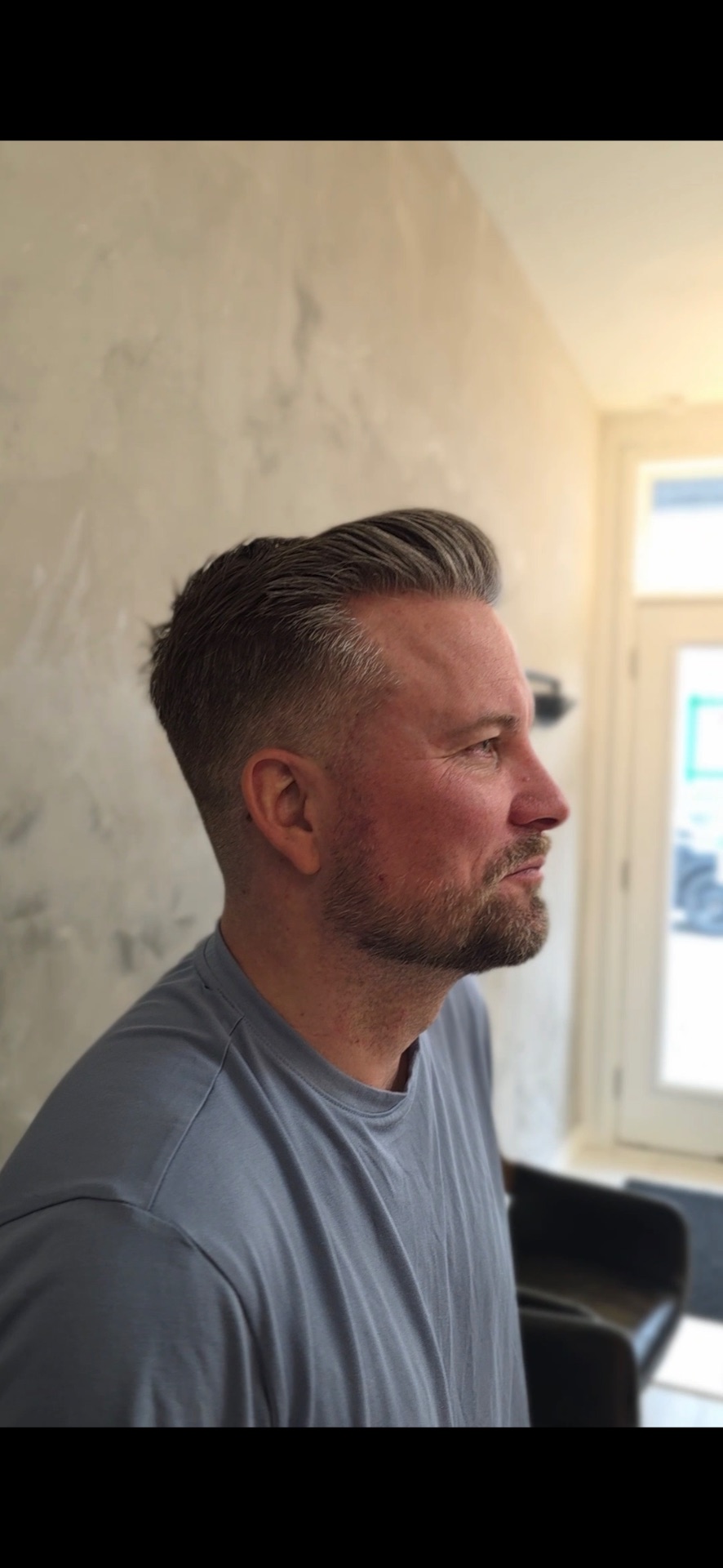 Classic side-part fade with beard detailing at Lads Fade Lounge