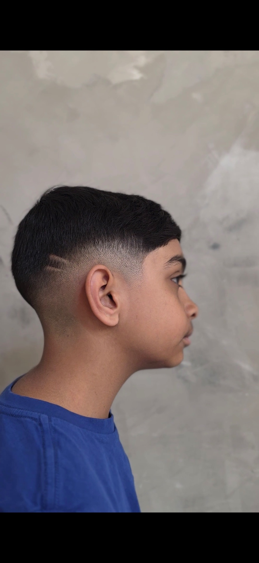Young Lads fade with a razor design detail at Lads Fade Lounge